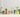A row of potted plants displayed in upcycled beer cans with vibrant designs, against a white corrugated background.