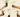 Five hands hold various plant plugs with exposed roots against a neutral beige background, showcasing young plant growth.