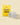 Yellow 'Dirt Bag' package with clear clear grow pots on a beige background