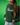Person wearing a dark green sweatshirt with white 'Plants' text against a green background