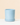 Light blue eco pot on a beige background